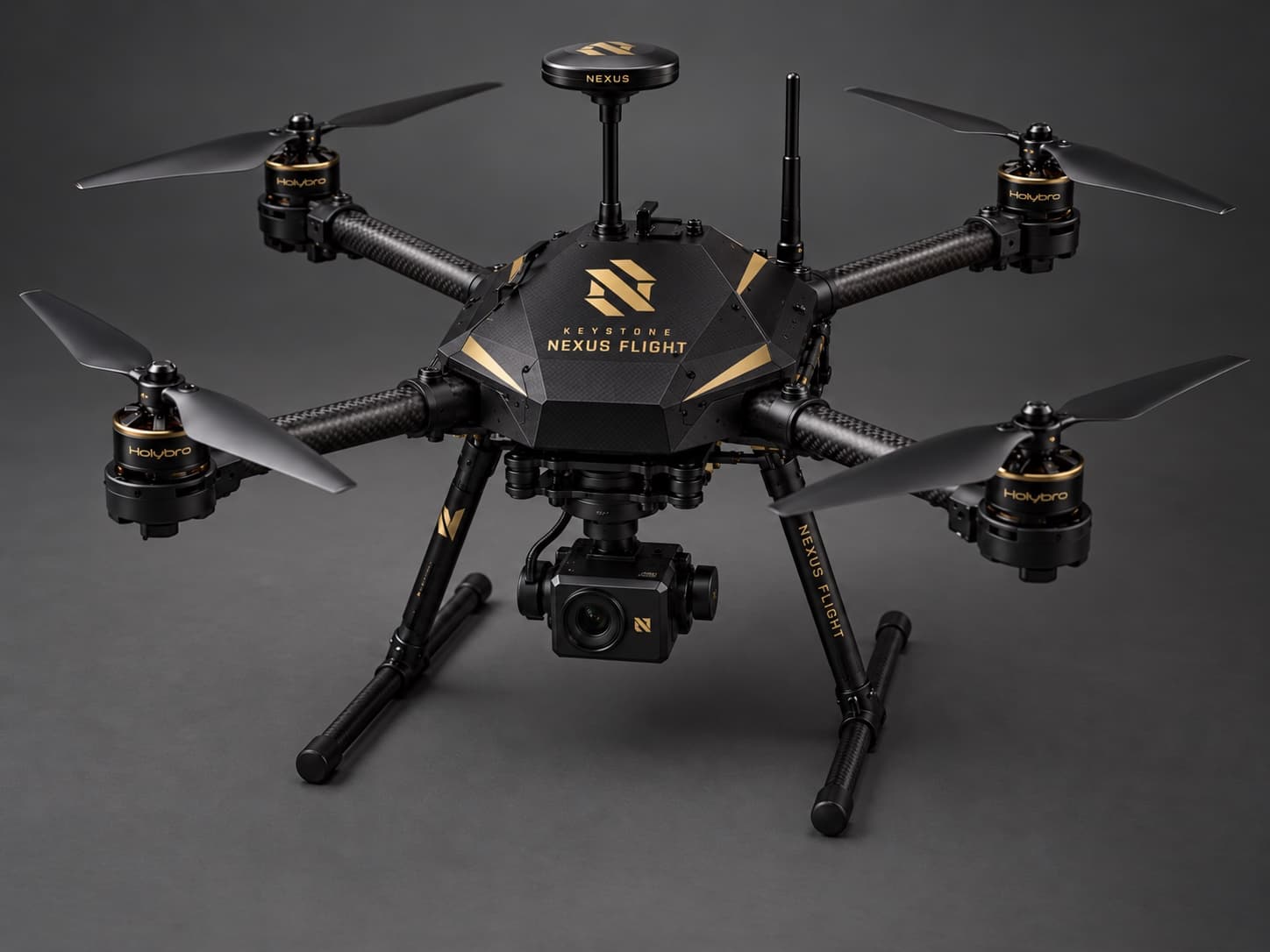 Nexus Flight drone prototype concept with black-and-gold body, four rotors, landing gear, and camera